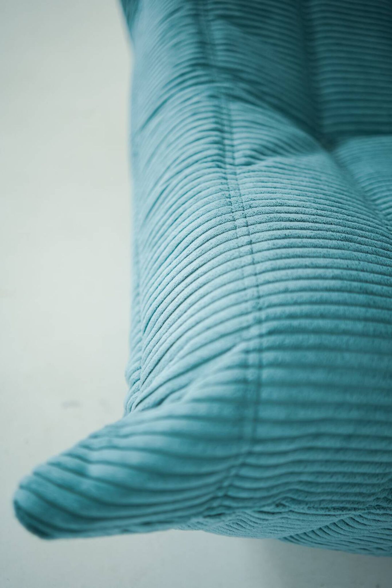 Togo set of armchair and pouf in light blue corduroy