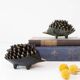 Hedgehog ensemble attributed to Walter Bosse, black patinated brass, circa 1950.