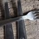 Mismatched set of 8 forks + 8 vintage shell stainless steel knives