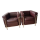 pair of authentic LC2 armchairs
