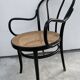 Fauteuil Thonet modèle 1018 en bois courbé noir et cannage 1930