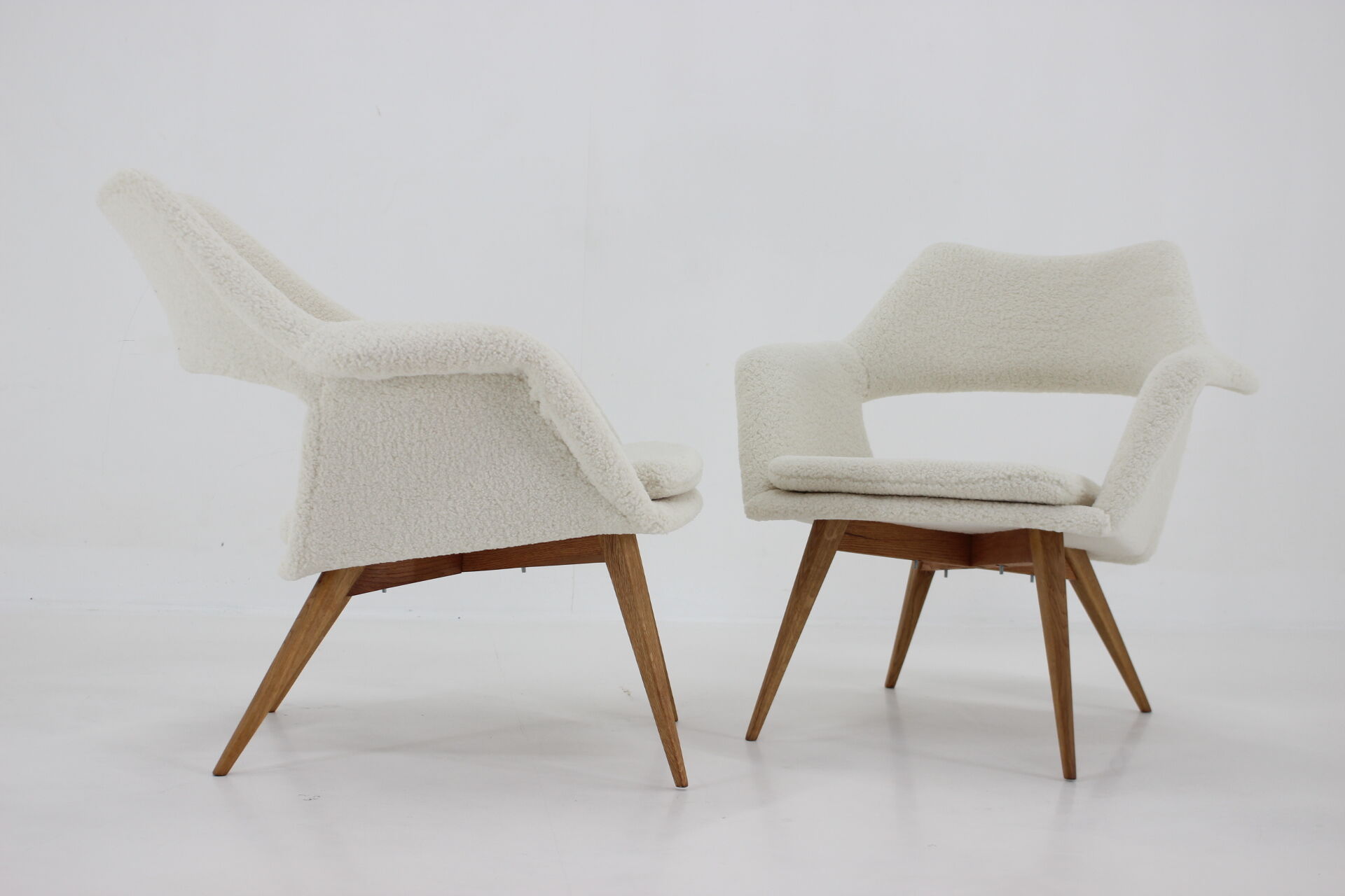 Pair of miroslav navratil shell lounge chairs in sheepskin fabric, czechoslovakia, 1960