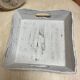 Old wooden tray with aged white patina