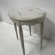 Art Deco style guéridon in patinated beech, 20th century.