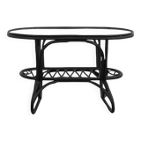 Black rattan and glass coffee table