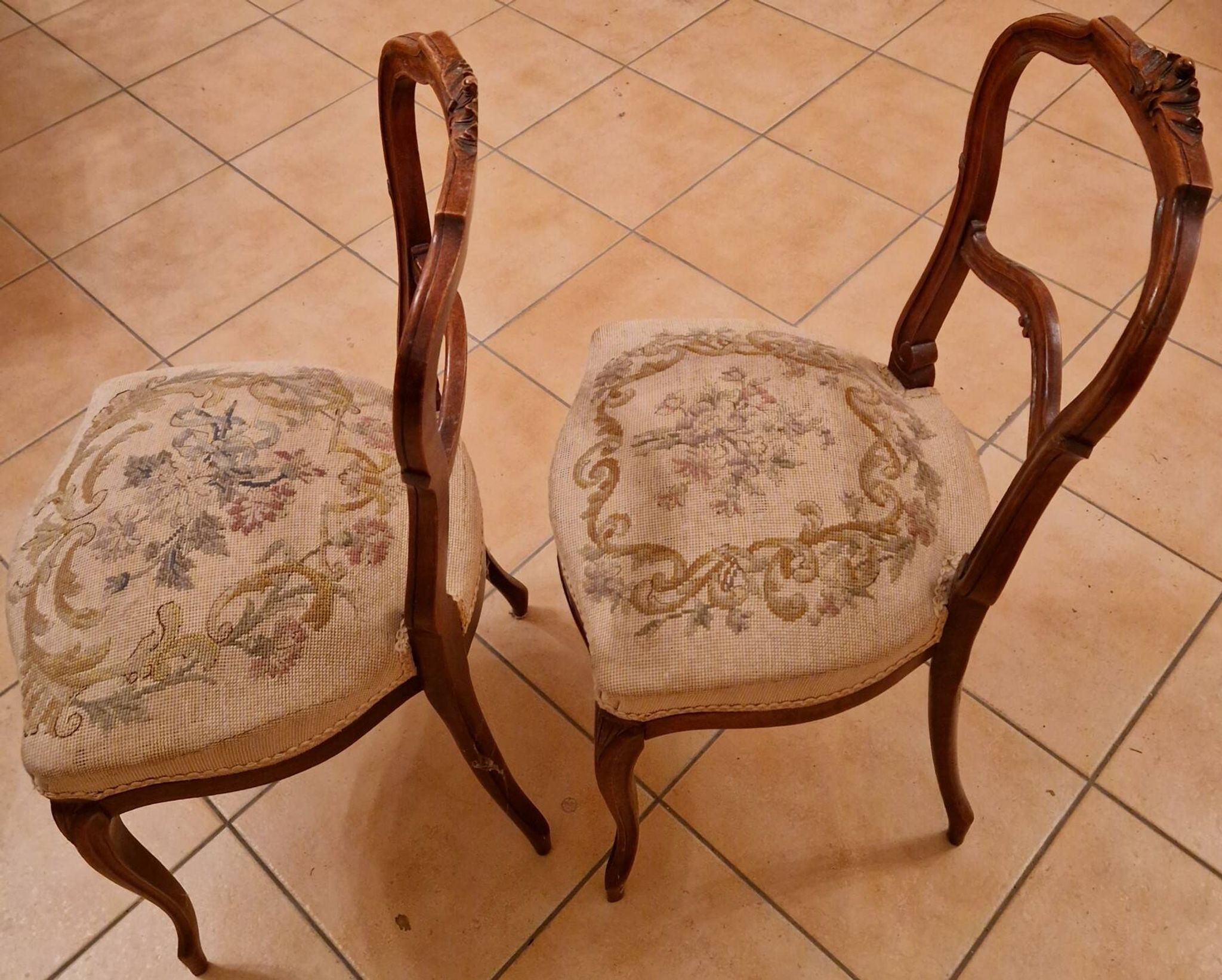Pair of Louis XV chairs – carved wood & antique upholstery – late 19th century