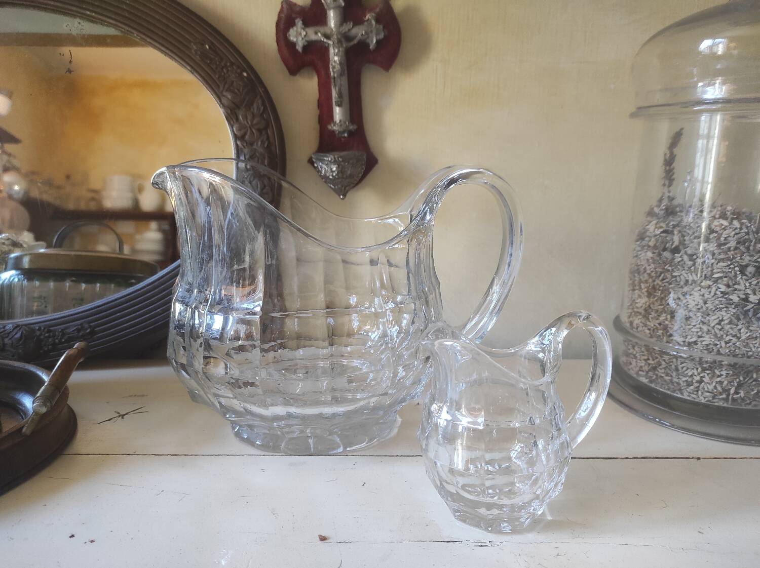 2 antique glass pitchers