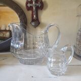 2 antique glass pitchers