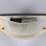 Paire d’appliques ‘demi-lune’ en laiton et verre