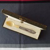 silver-plated baby feeding spoon