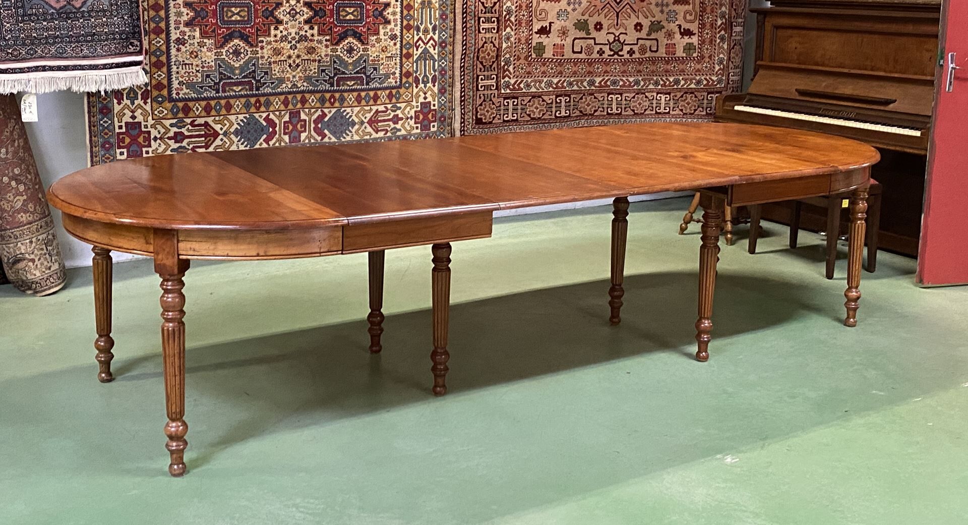 Louis Philippe round table 8 feet in cherry with 6 extensions
