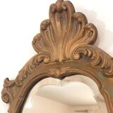Bakelite scrolled mirror with rocaille pediment