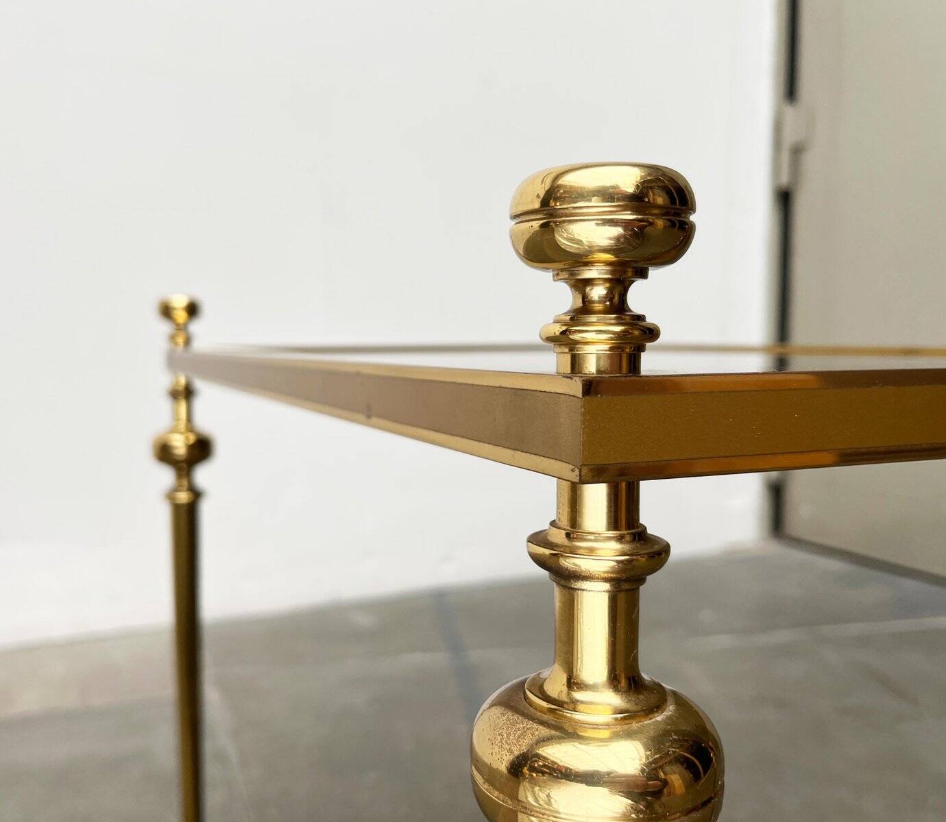 Mid-century Hollywood neoclassical brass and glass side or bedside tables attributed to Vereinigte Werkstätten, Germany, 1960s, set of 2.