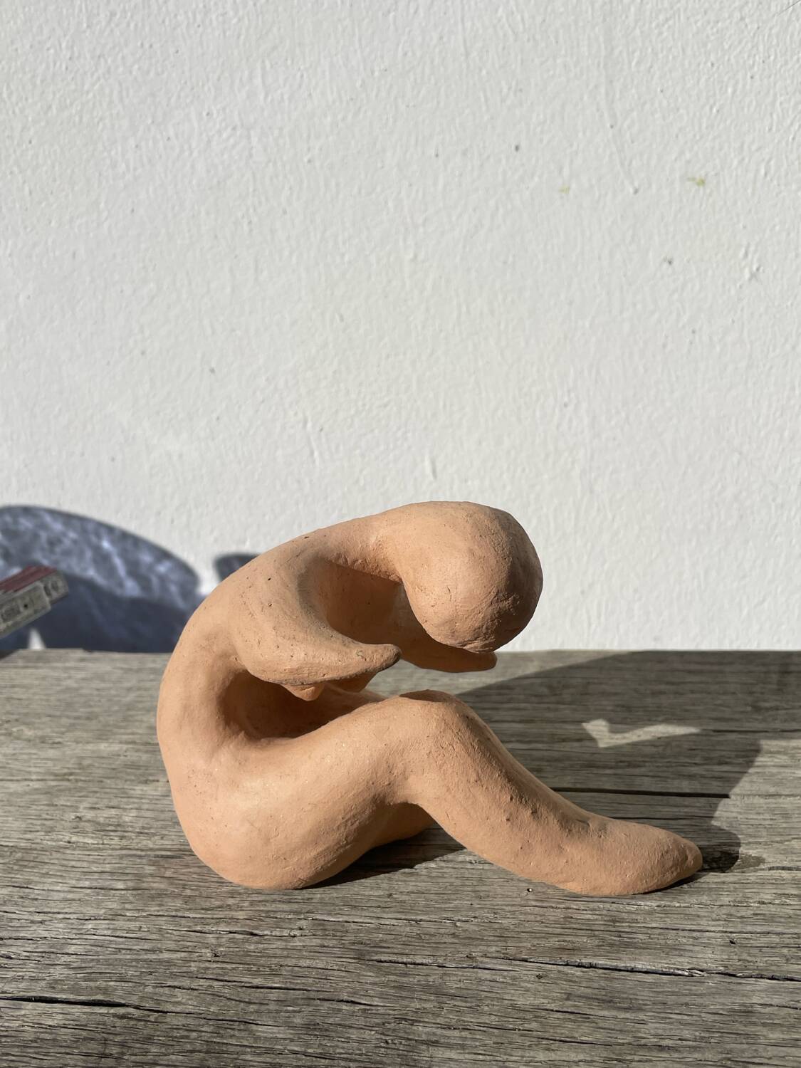 Terracotta sculpture figurine of a woman