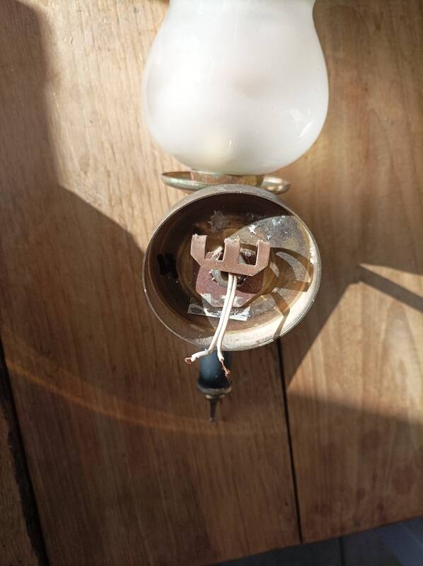 Frosted glass globe wall light with patinated gold metal base dp 1123204