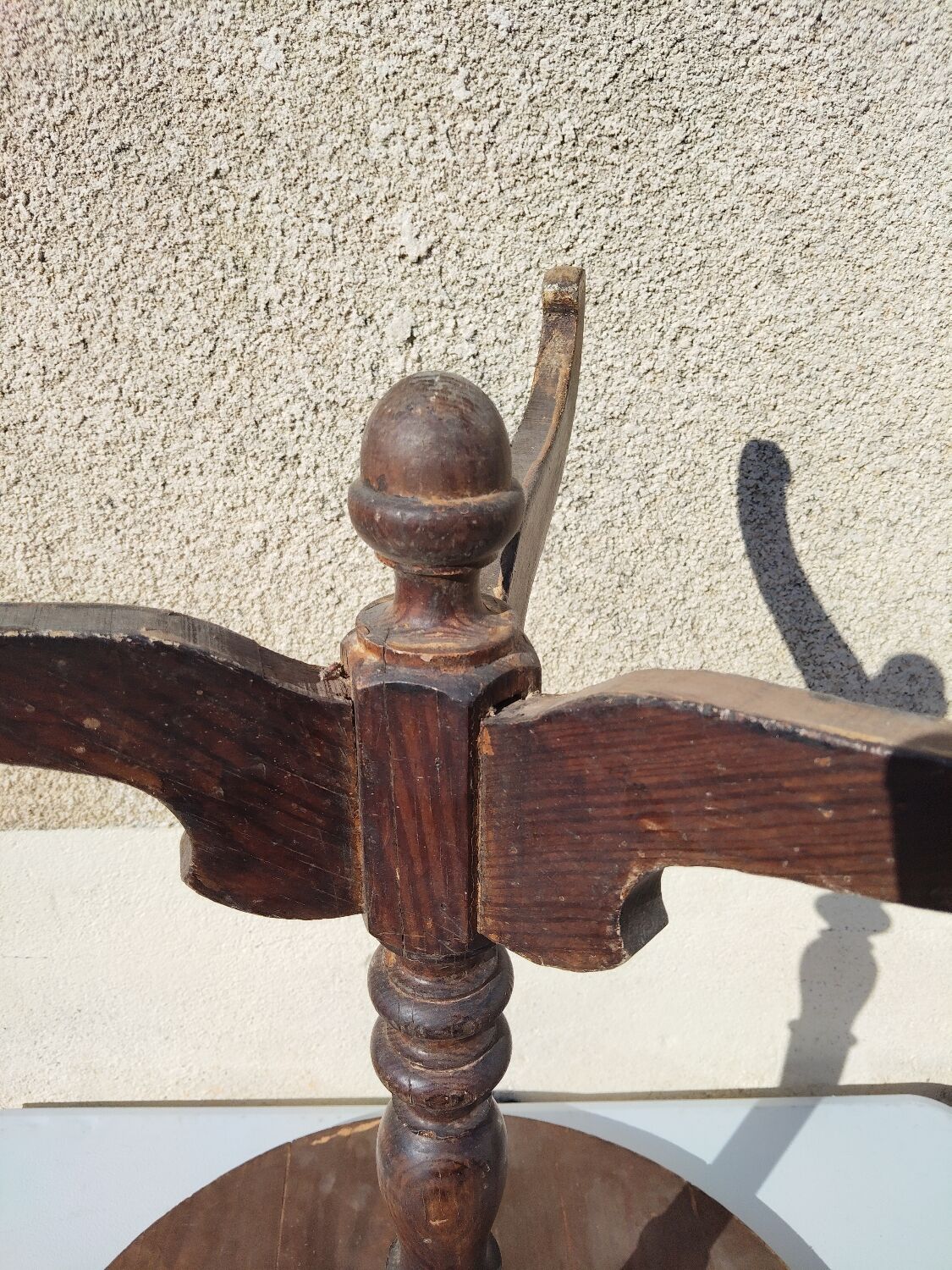 Small rustic antique tripod side table made of solid wood.