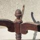 Small rustic antique tripod side table made of solid wood.