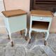 Renovated bedside tables in laurel green and light wood.