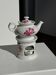 Complete porcelain teapot and warmer with pink floral decoration H18