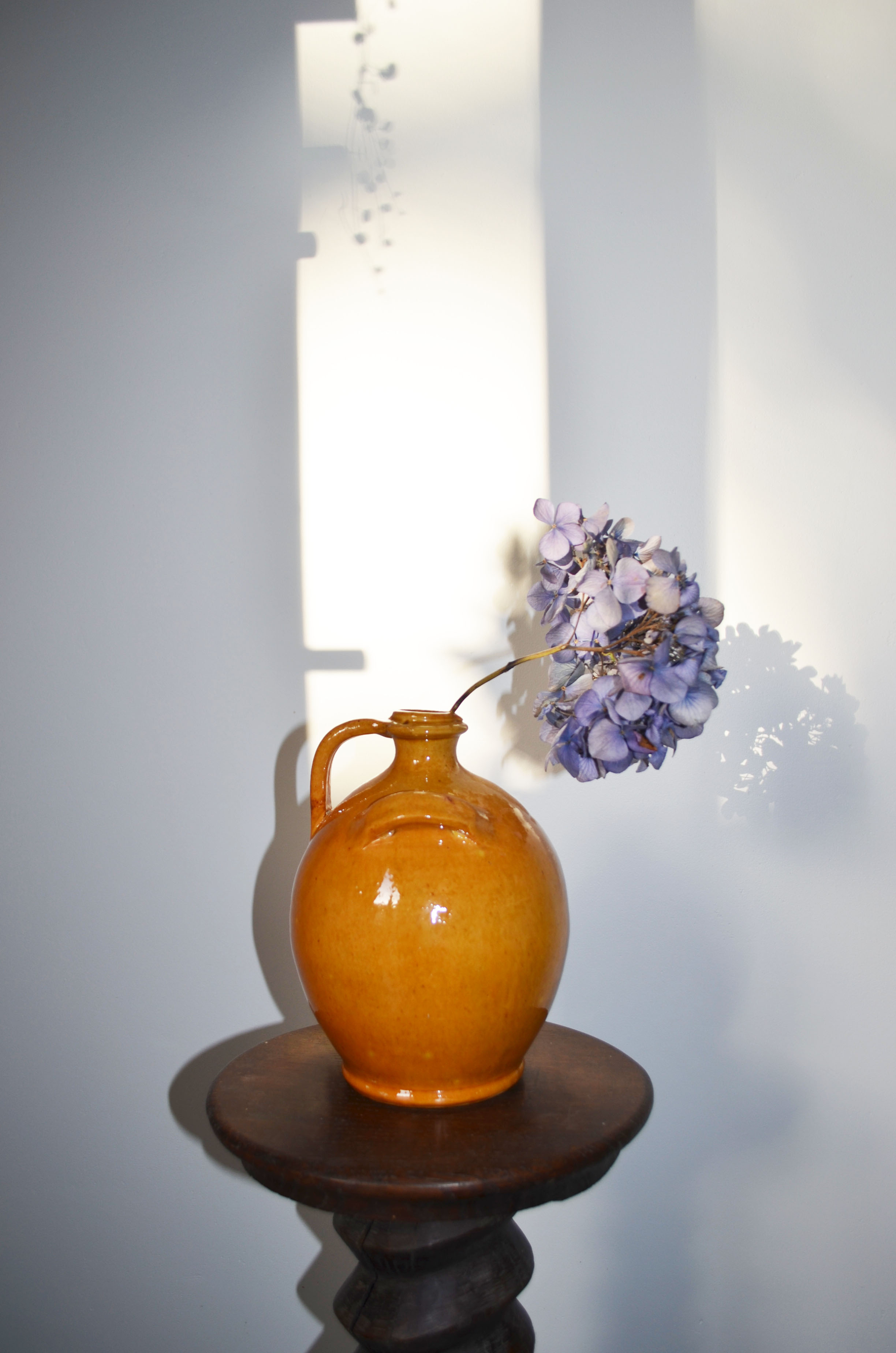 Biot jug in glazed ochre ceramic