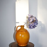 Biot jug in glazed ochre ceramic
