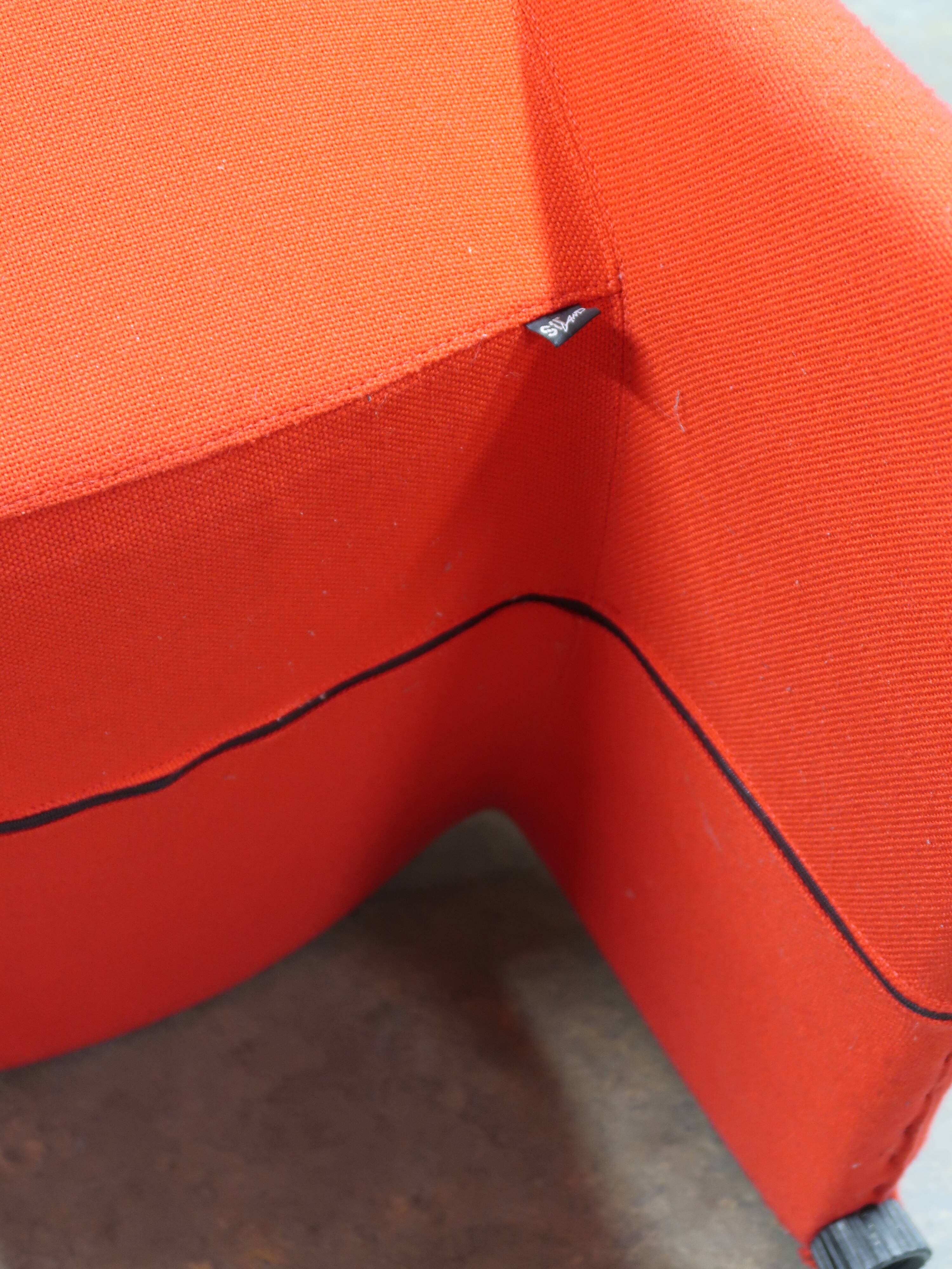 Pair of vintage red armchairs