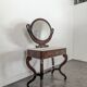 Restoration period flamed mahogany swan neck dressing table