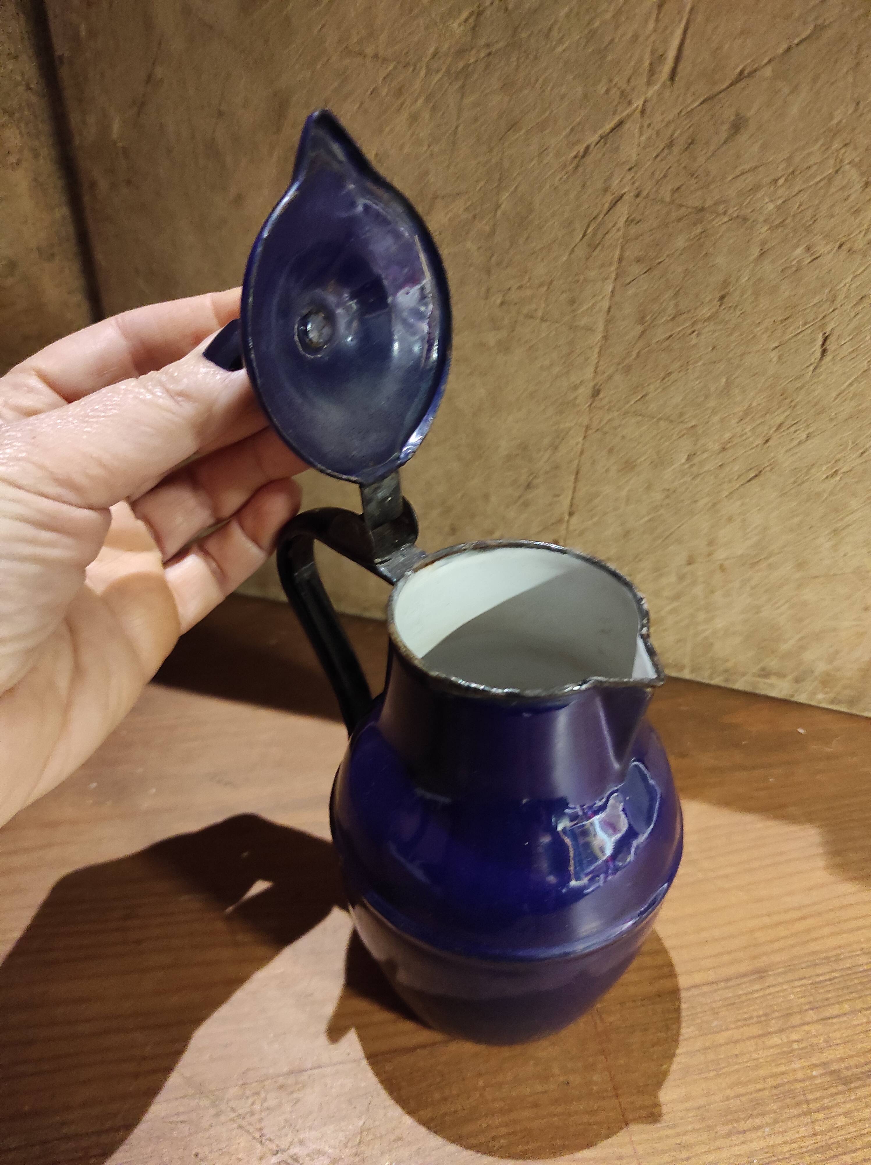 Small vintage French jug with lid, in blue enamel