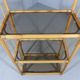 Rattan & smoked glass display rack 1970’s
