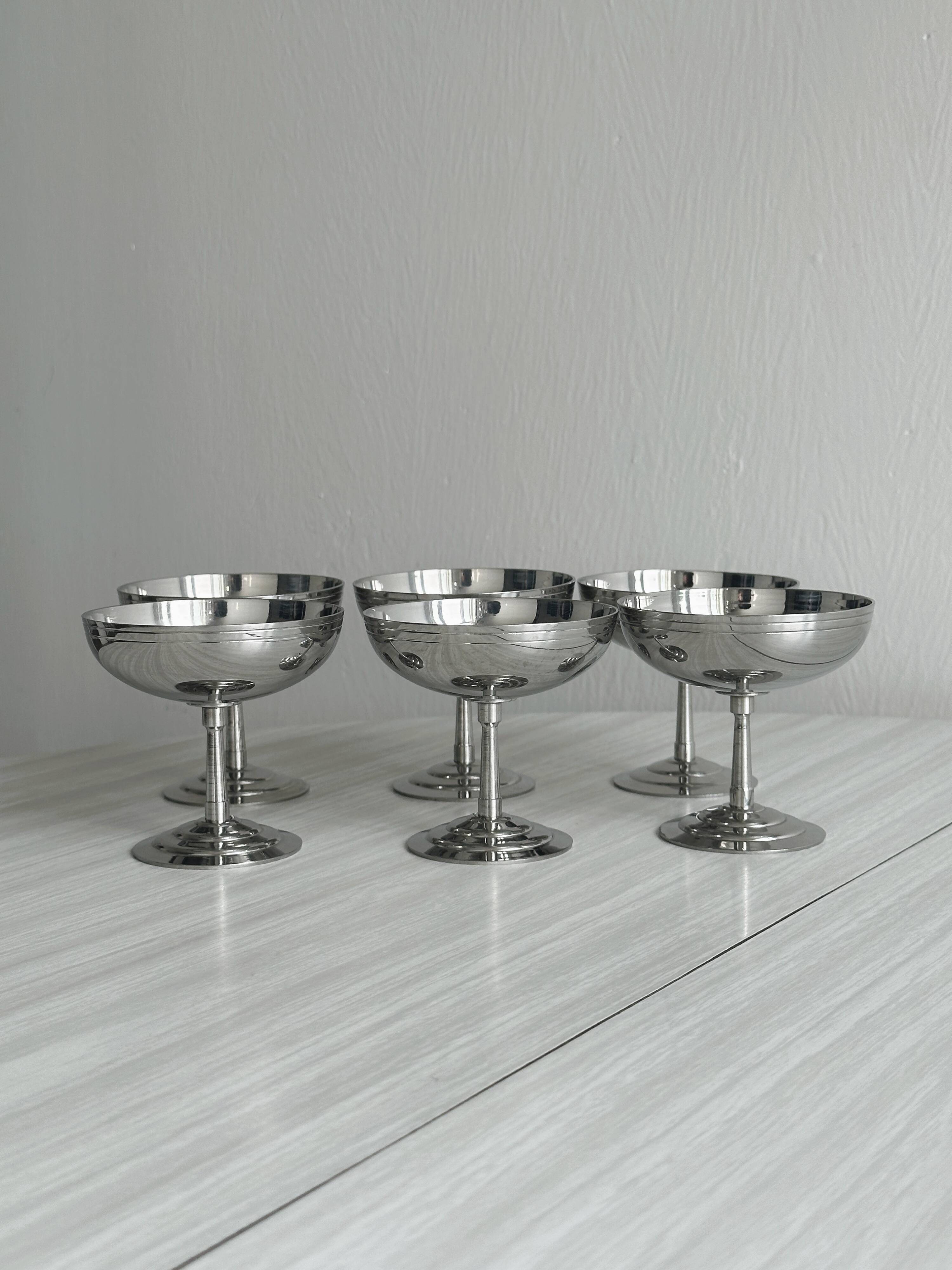 6 Letang Remy shiny stainless steel footed bowls.