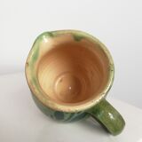 Vase with green handle