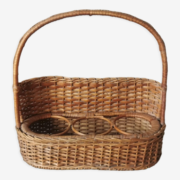 Vintage wicker bottle rack