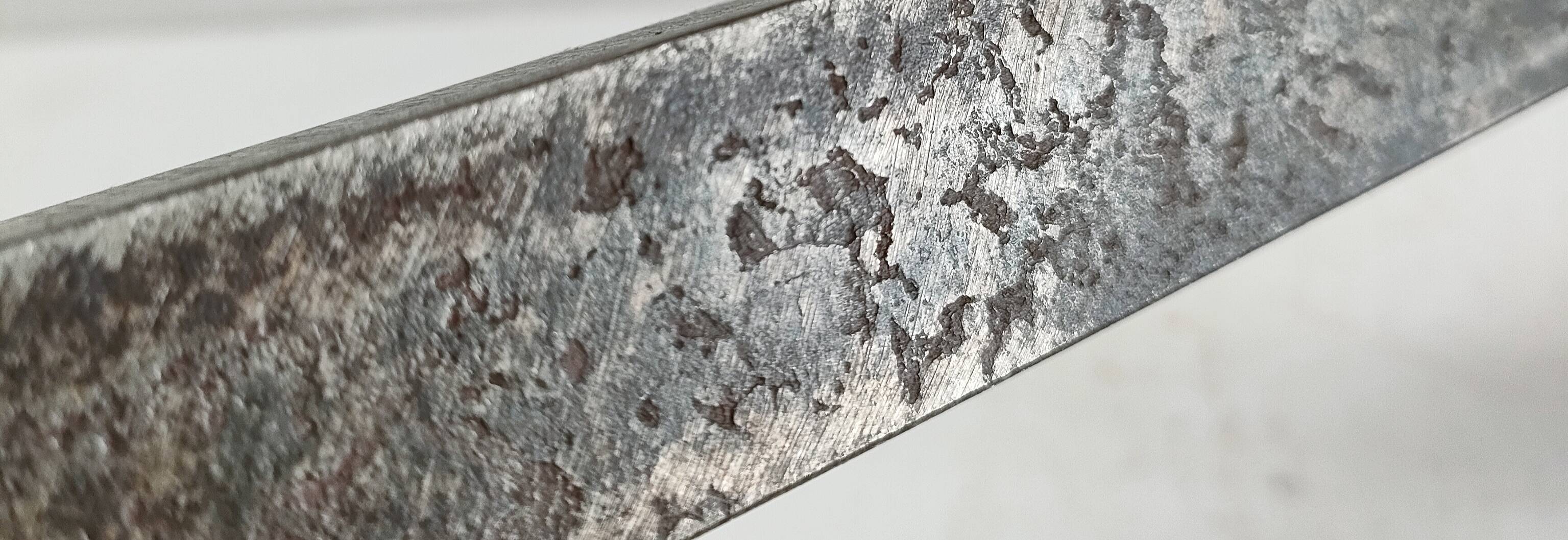 Pair of vintage steel fleur-de-lys andirons