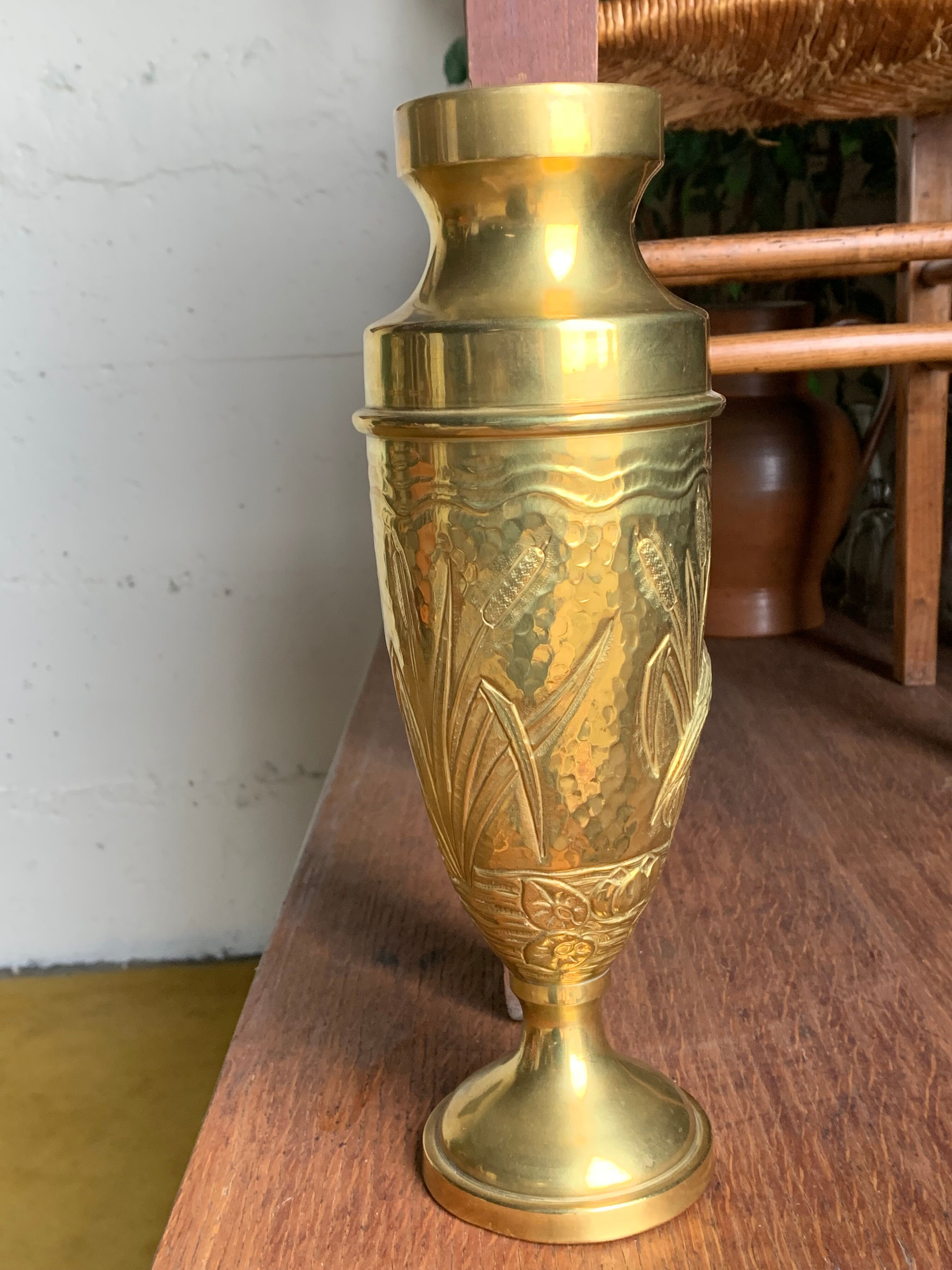 Brass vase with crane decoration