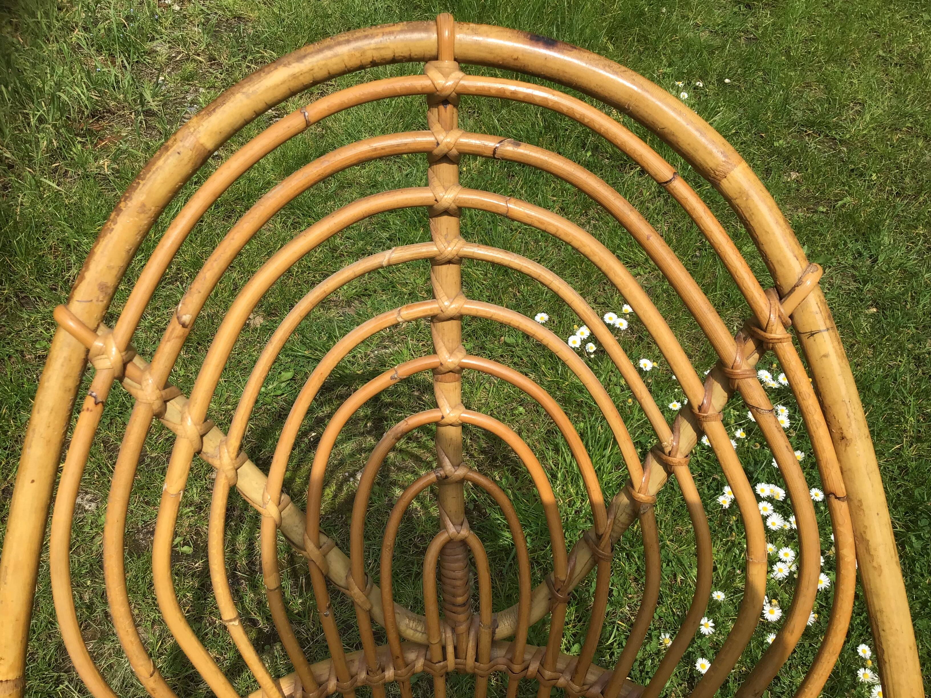 Vintage ovoid-shaped rattan armchair.