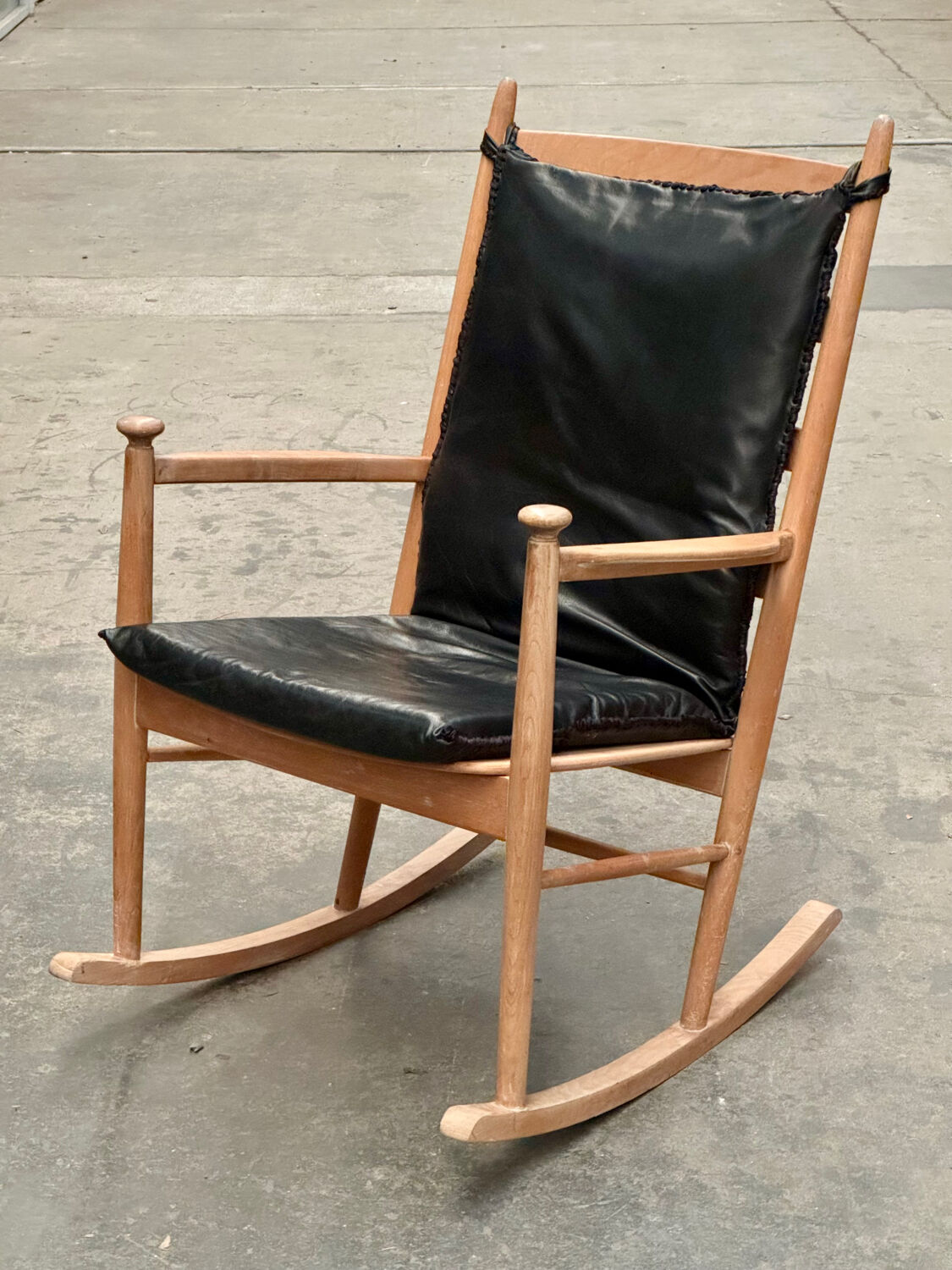 Scandinavian wooden and leather rocking chair