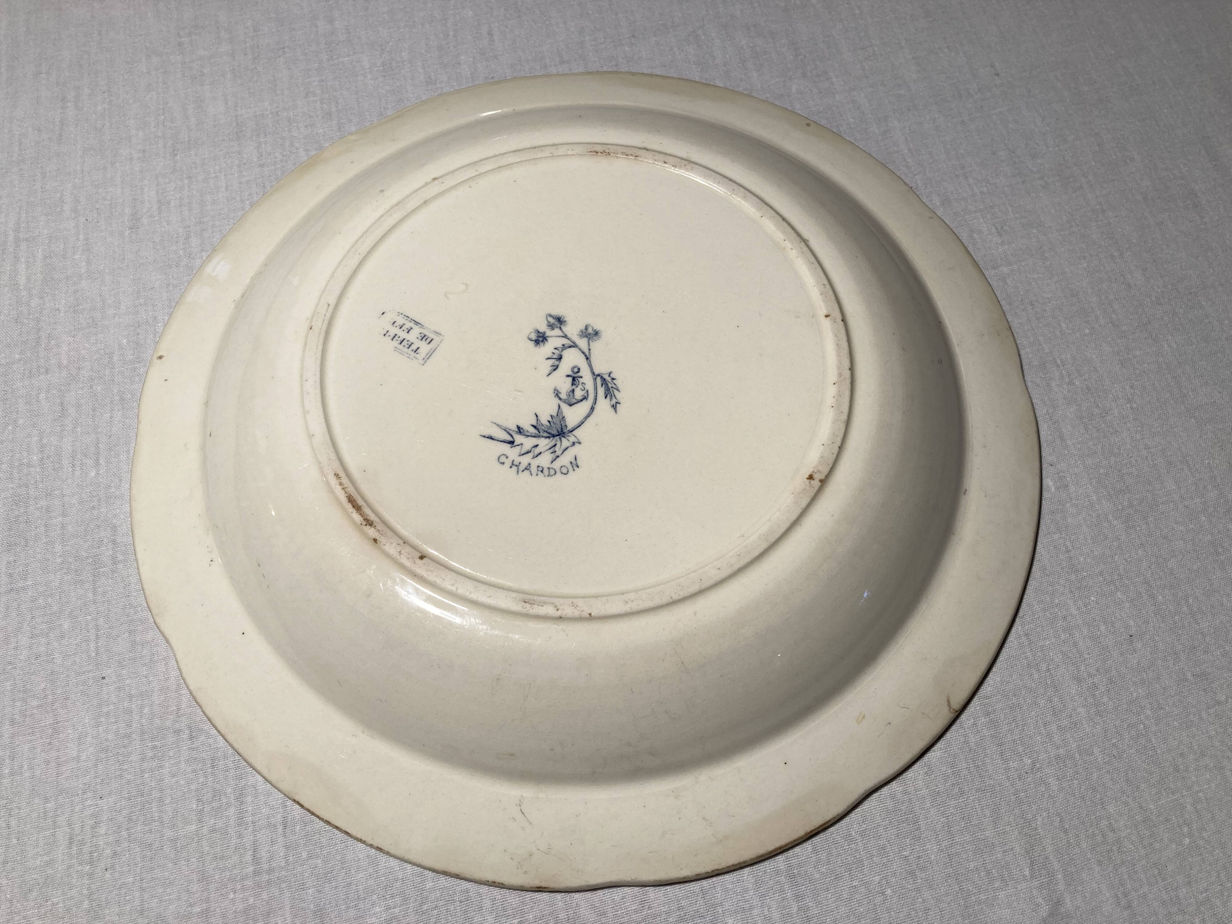 Plat rond en terre de fer, Clairefontaine, modèle Chardon, fin XIXe