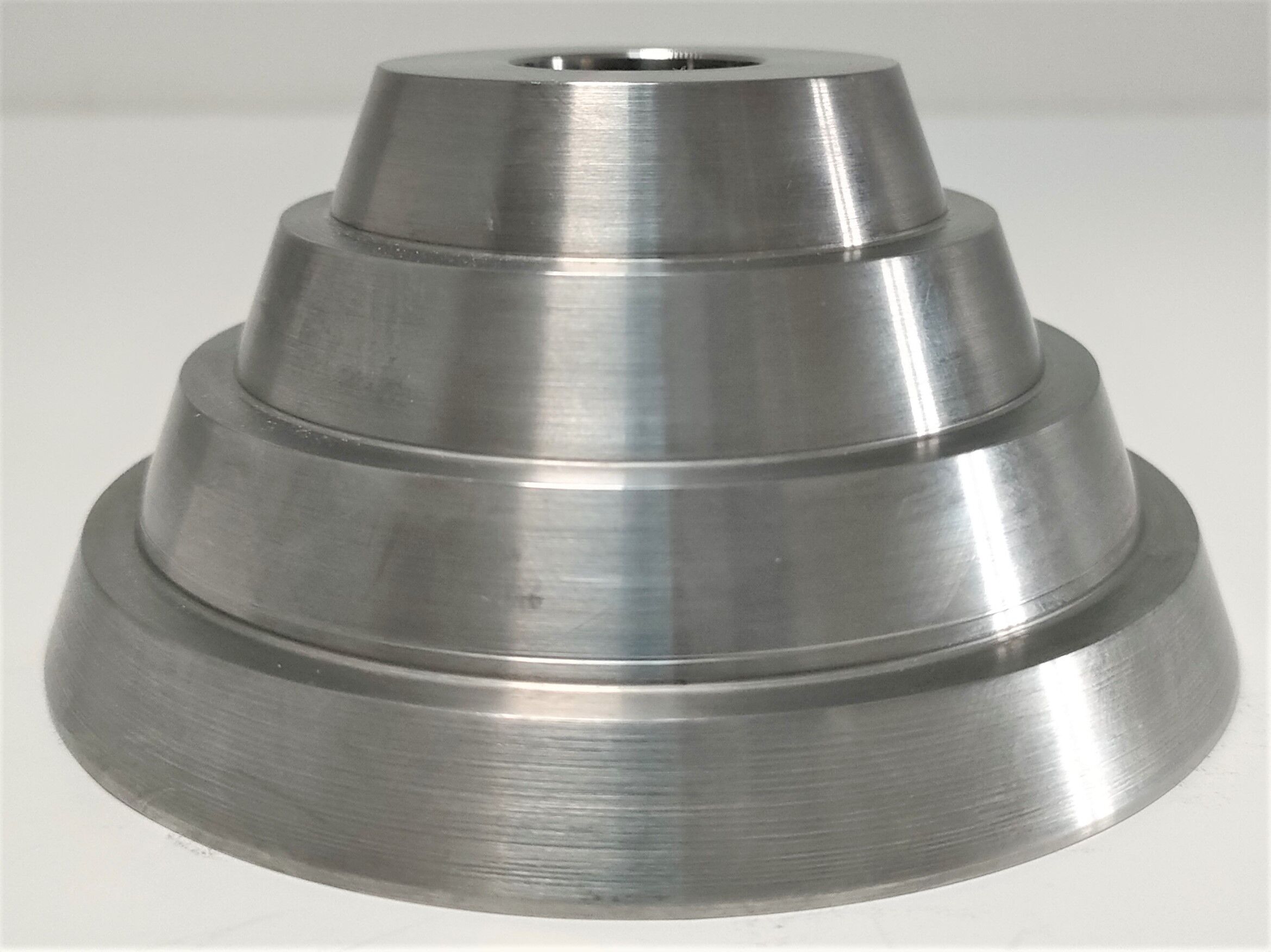 Solid steel candle holder turned design