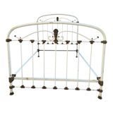 Antique wrought iron bed from the 1900s