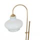 Standing metal lamp with glass shade