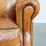 Ensemble de 2 fauteuils en cuir de mouton avec finition passepoil noir