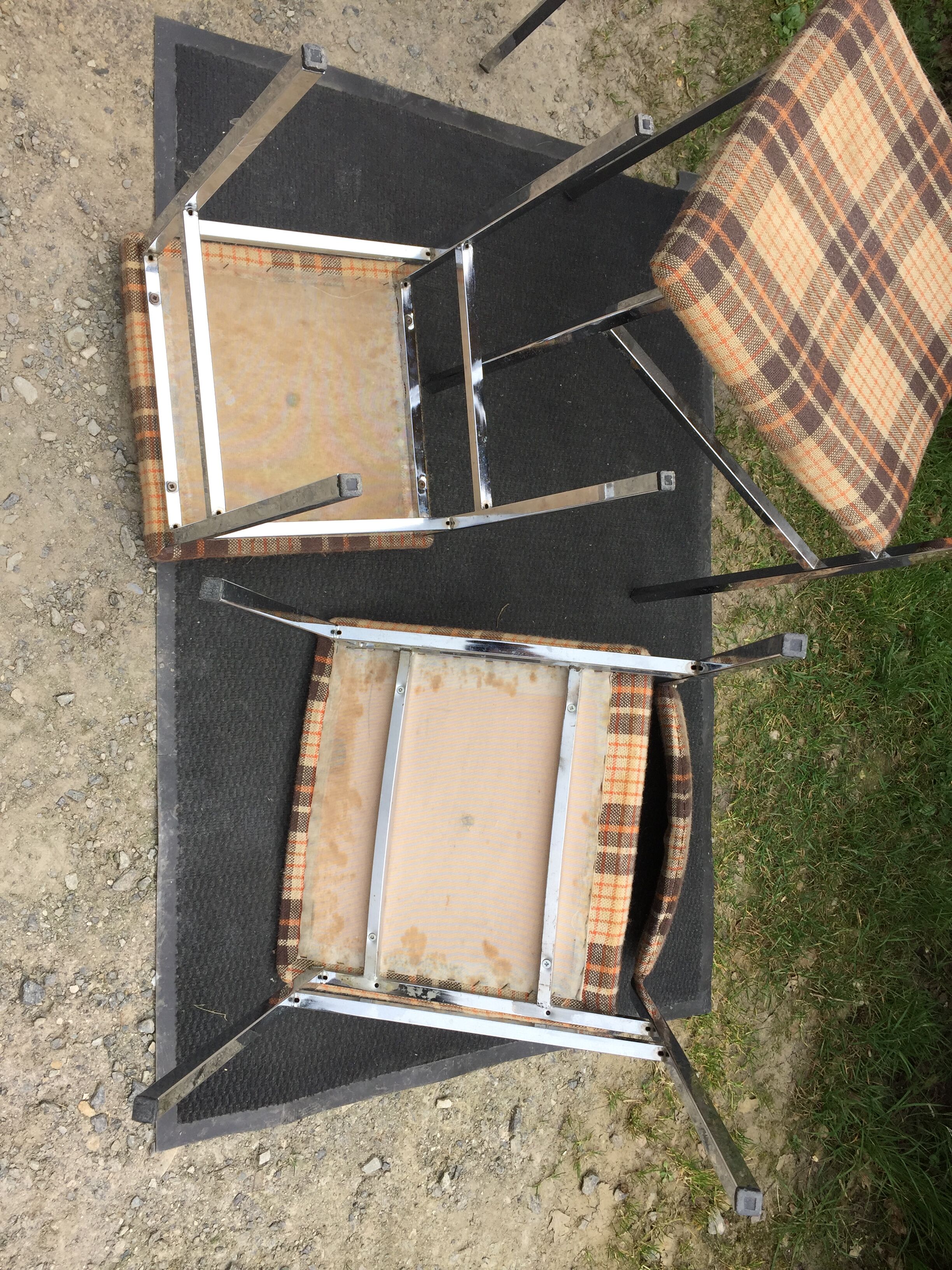 Vintage chairs and stools with chrome-plated square tubular metal base.