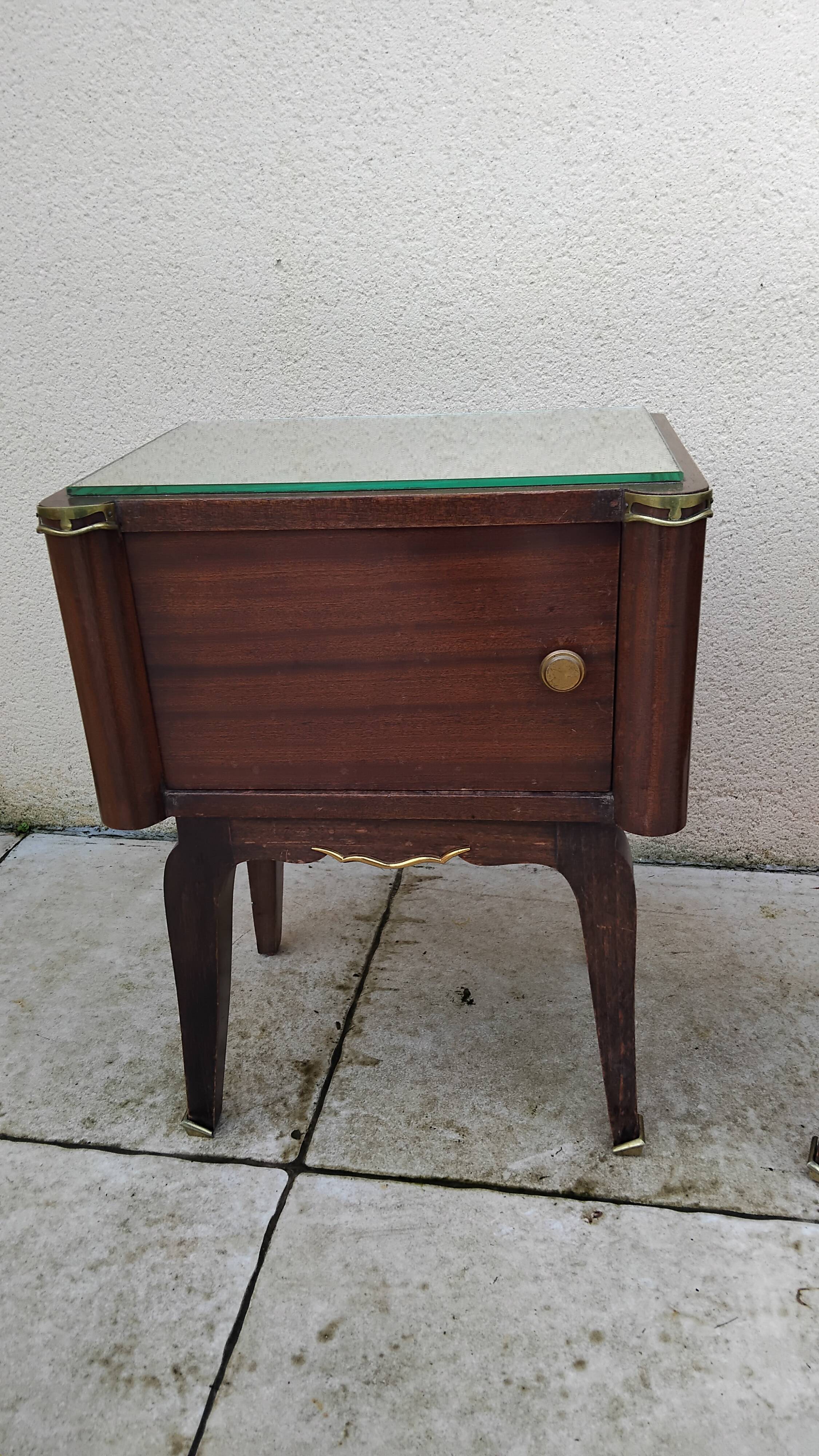 Vintage bedside table with a mirrored top, Art Deco style.
