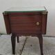 Vintage bedside table with a mirrored top, Art Deco style.