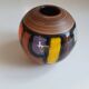 Mid-century pattern Vetrata vases and bowls by Aldo Londi for Bitossi Italy. Black, blue, orange and yellow on a brushed background.