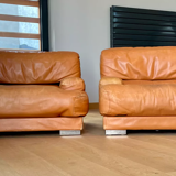 Pair of vintage armchairs Gérard Guermonprez tawny leather and stainless steel, France 1970
