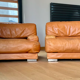 Paire de fauteuils vintage Gérard Guermonprez cuir fauve et inox, France 1970
