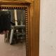 Louis XVI style mirror in wood and gilded stucco 20th century