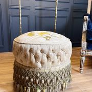 Napoleon III period ottoman in original upworked fabric with wheels