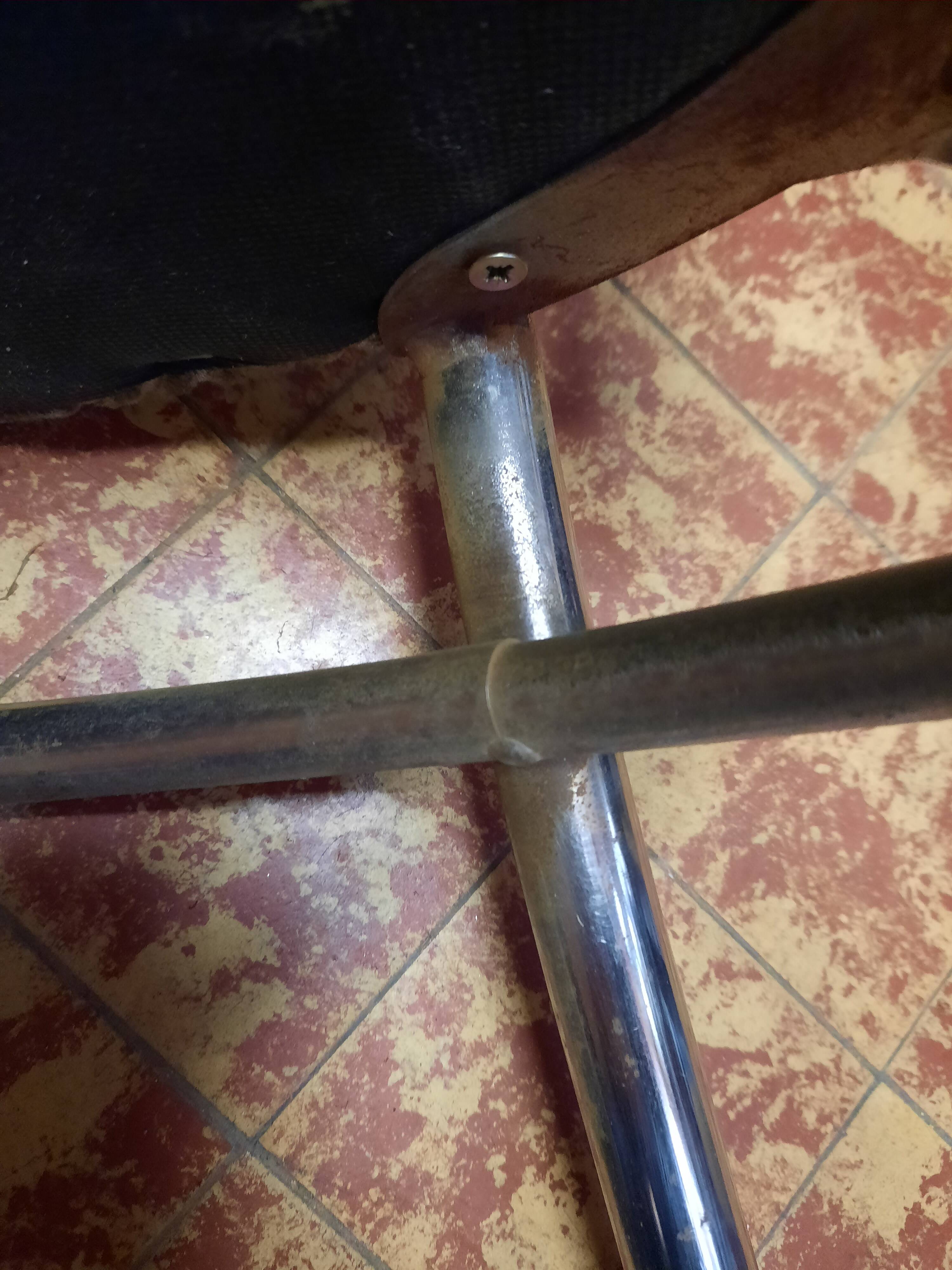 Pair of tubular metal bistro chairs